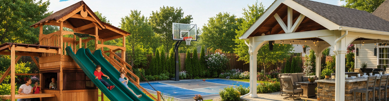 A large outdoor backyard scene with a wooden playhouse featuring a green slide, a basketball hoop, a covered patio with dining furniture, and a pool area surrounded by trees and landscaping.