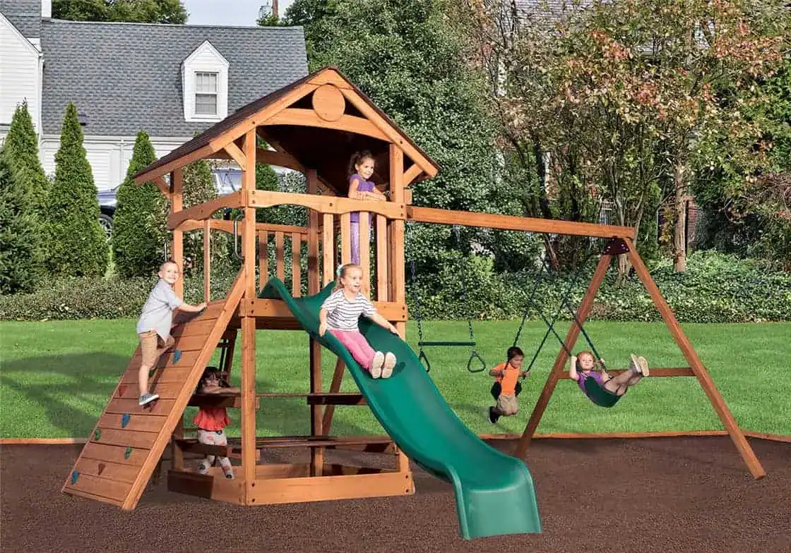 Adventure Outlook Summit Outlook XL 1 Kids sliding, swinging, and climbing on summit outlook playset